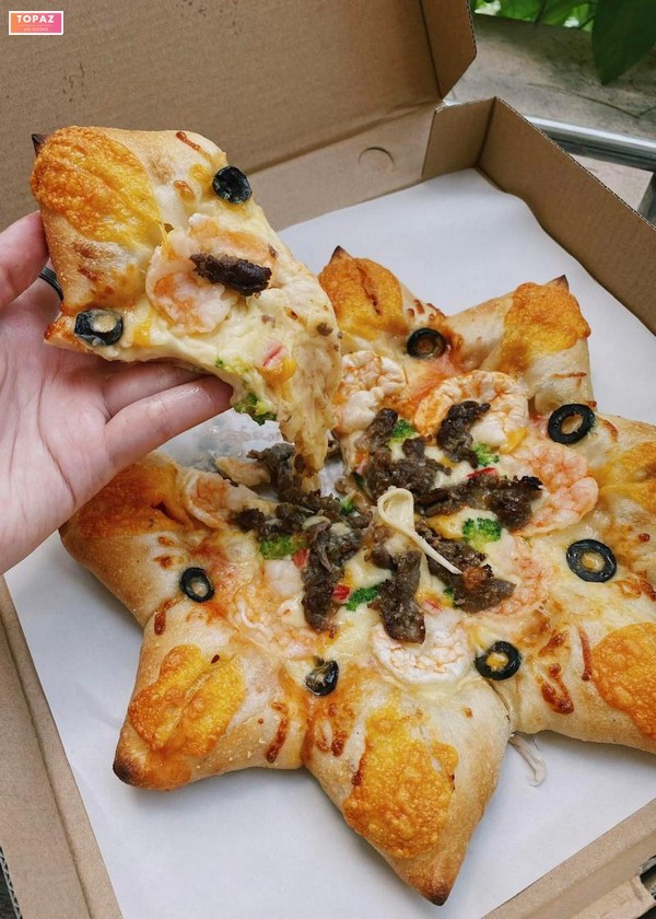 Star Pizza là loại bánh đặc trưng của quán với phần đế được làm theo hình ngôi sao